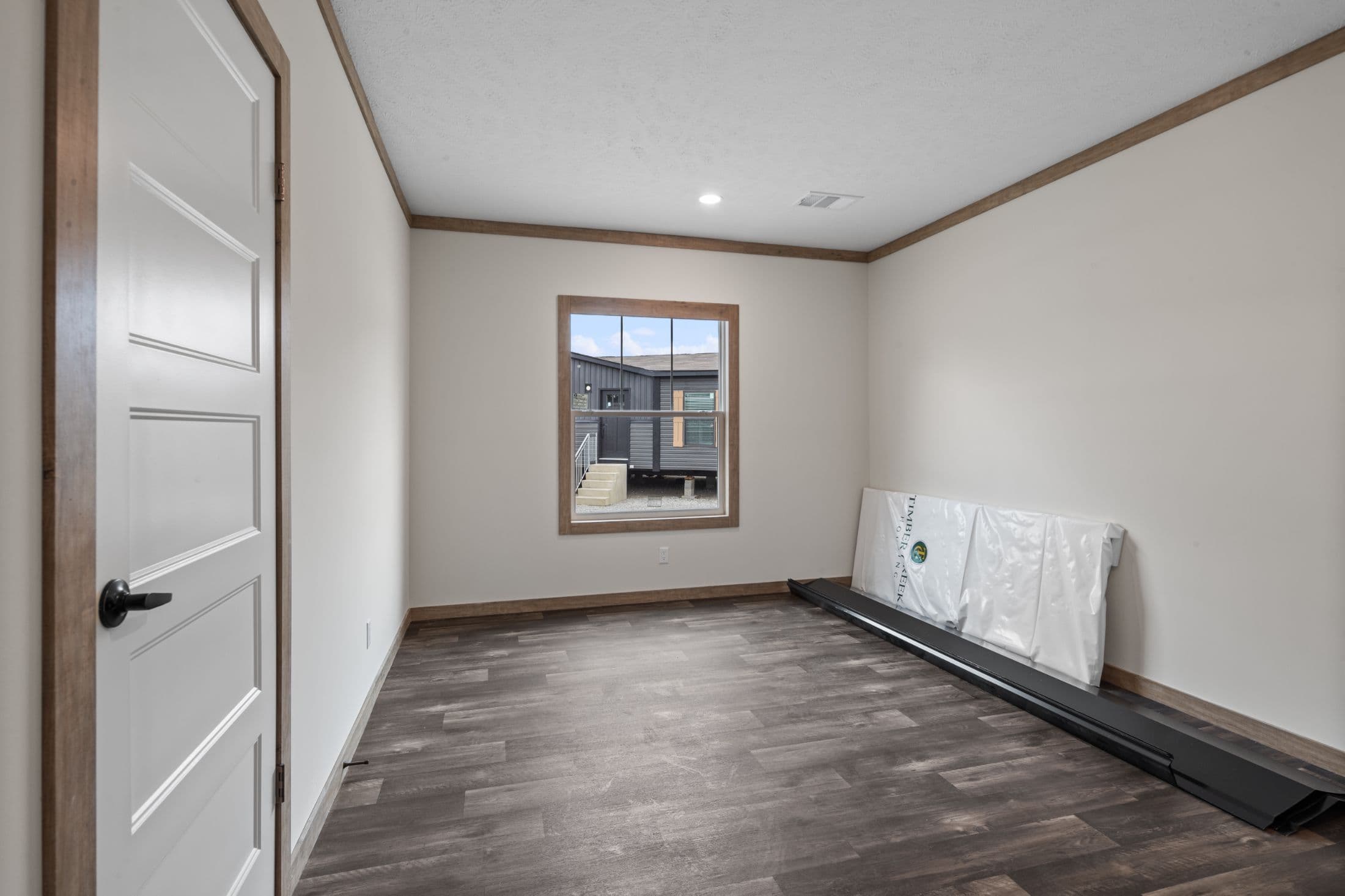 The white oak interior and bedroom home features