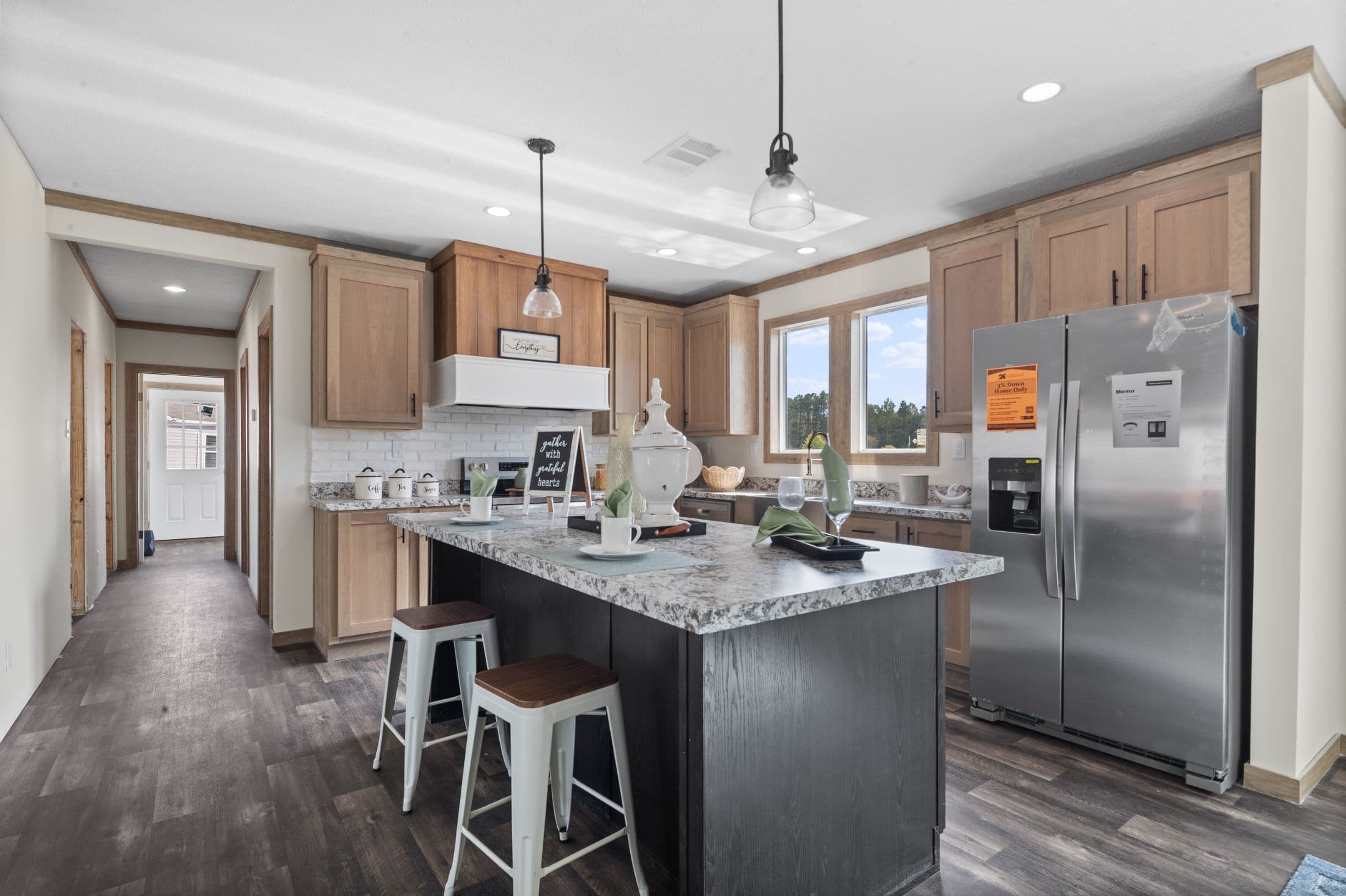 The white oak interior and kitchen home features