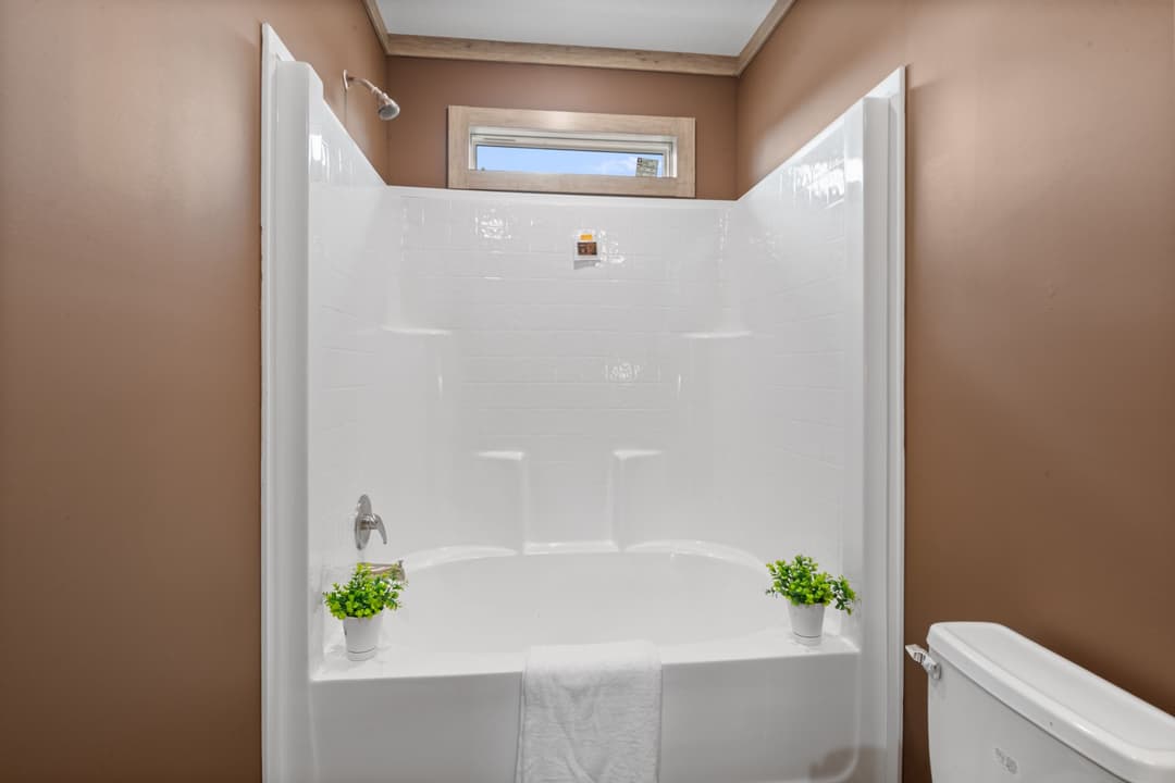 The white oak interior and bathroom home features