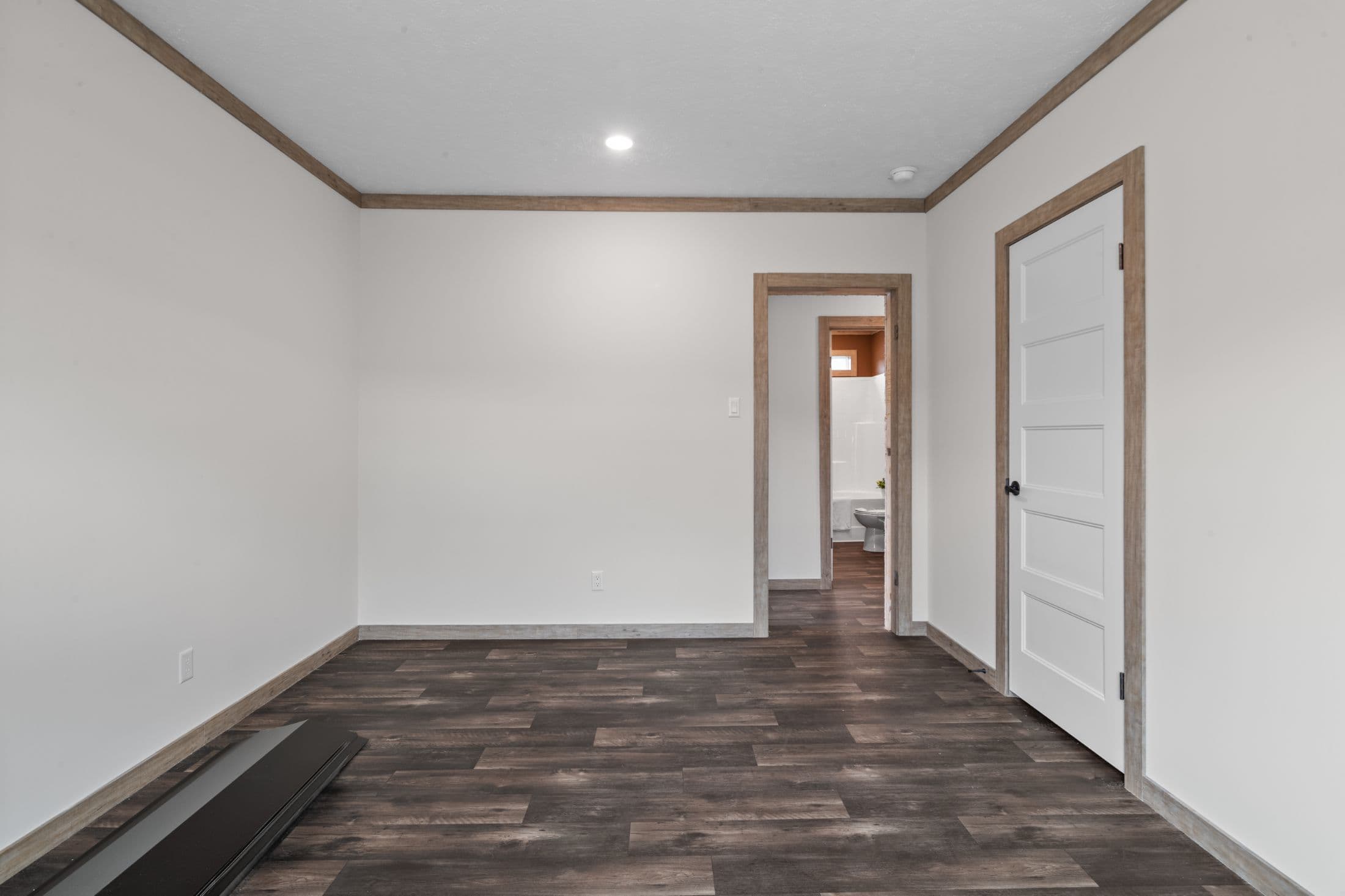 The white oak interior and bedroom home features