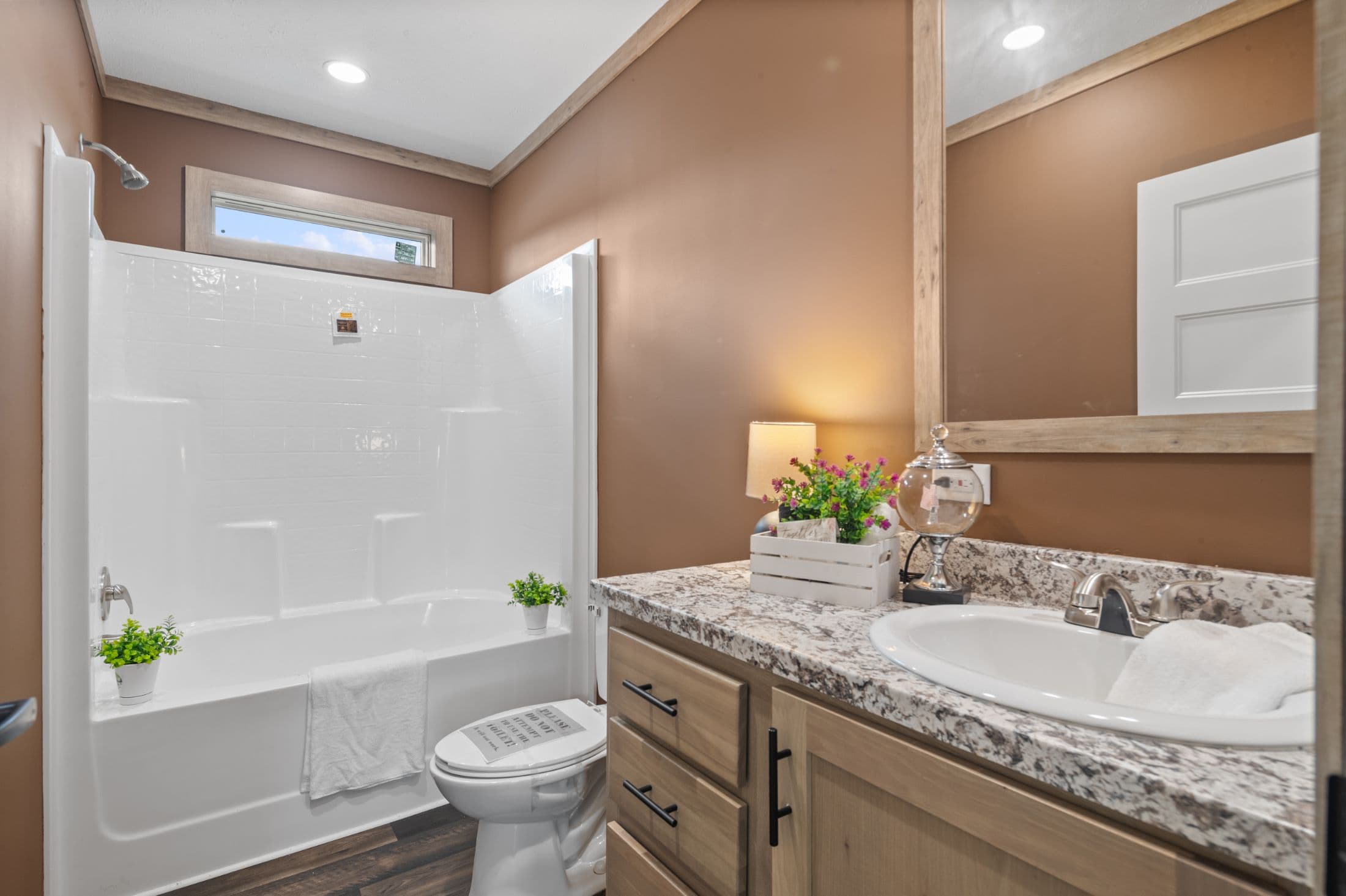 The white oak interior and bathroom home features